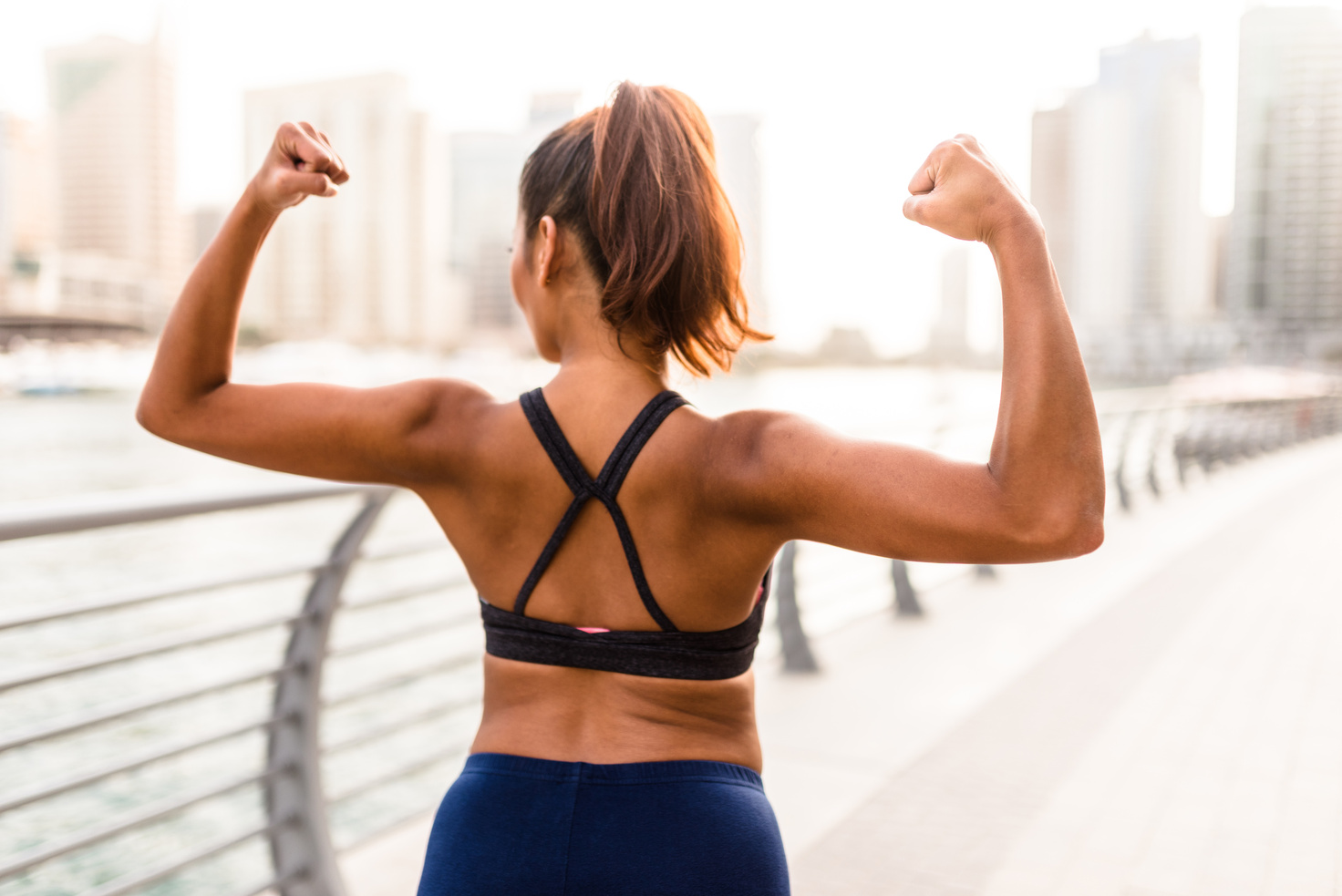 woman showing the muscle